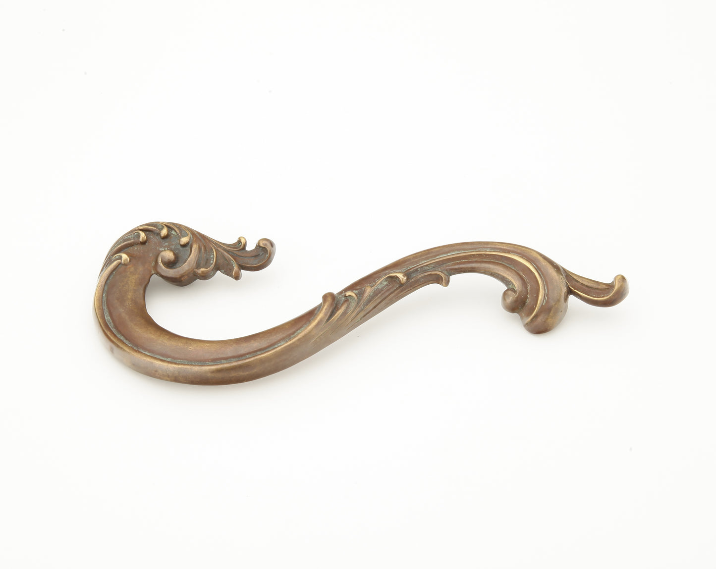 Schaub Solid Brass large curved pull. left in Monticello Brass 5" in Monticello Brass